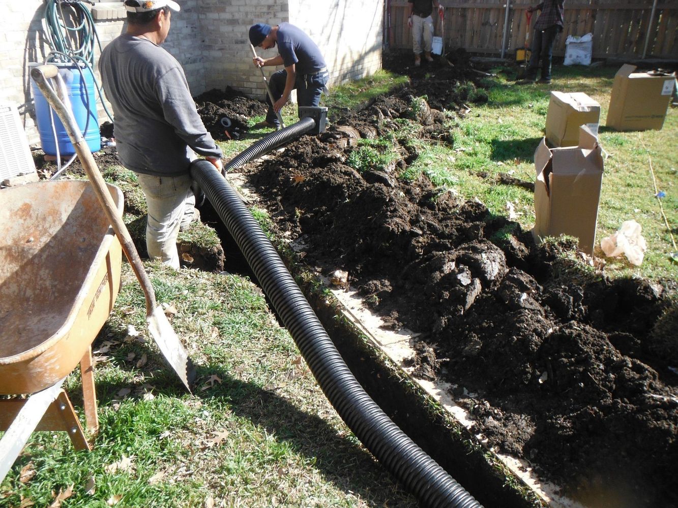 Landscaping project with soil and pipes