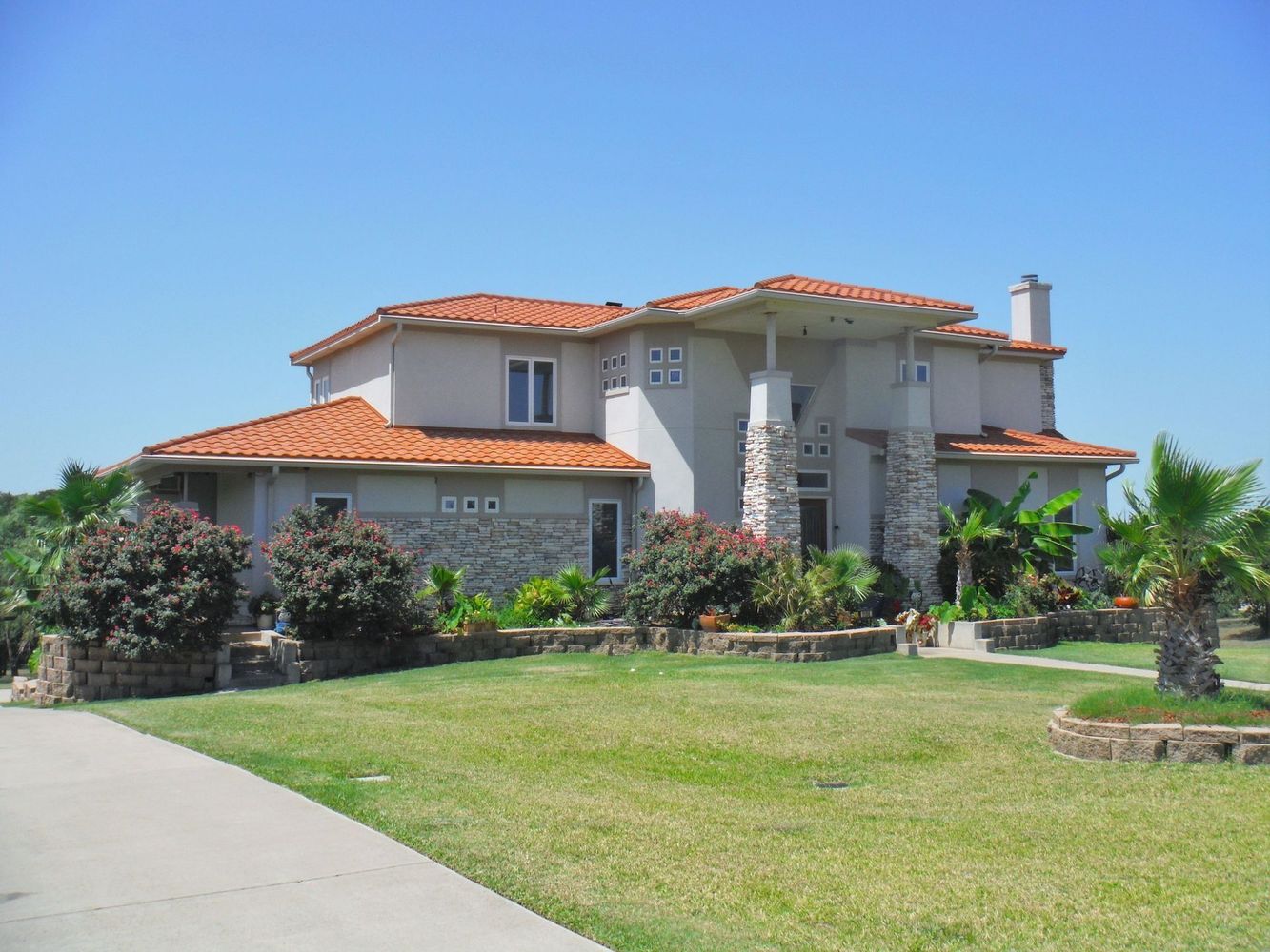 Two-story home with garden