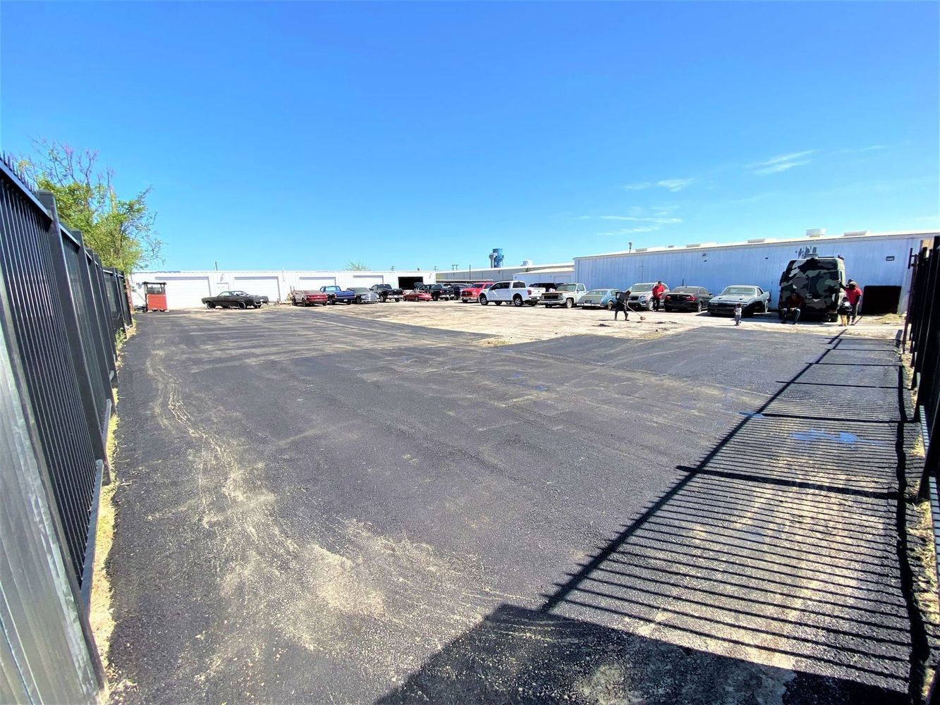 Spacious parking lot with vehicles