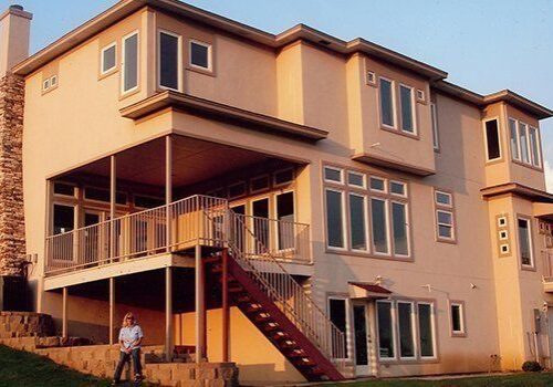 Modern two-story house with large windows